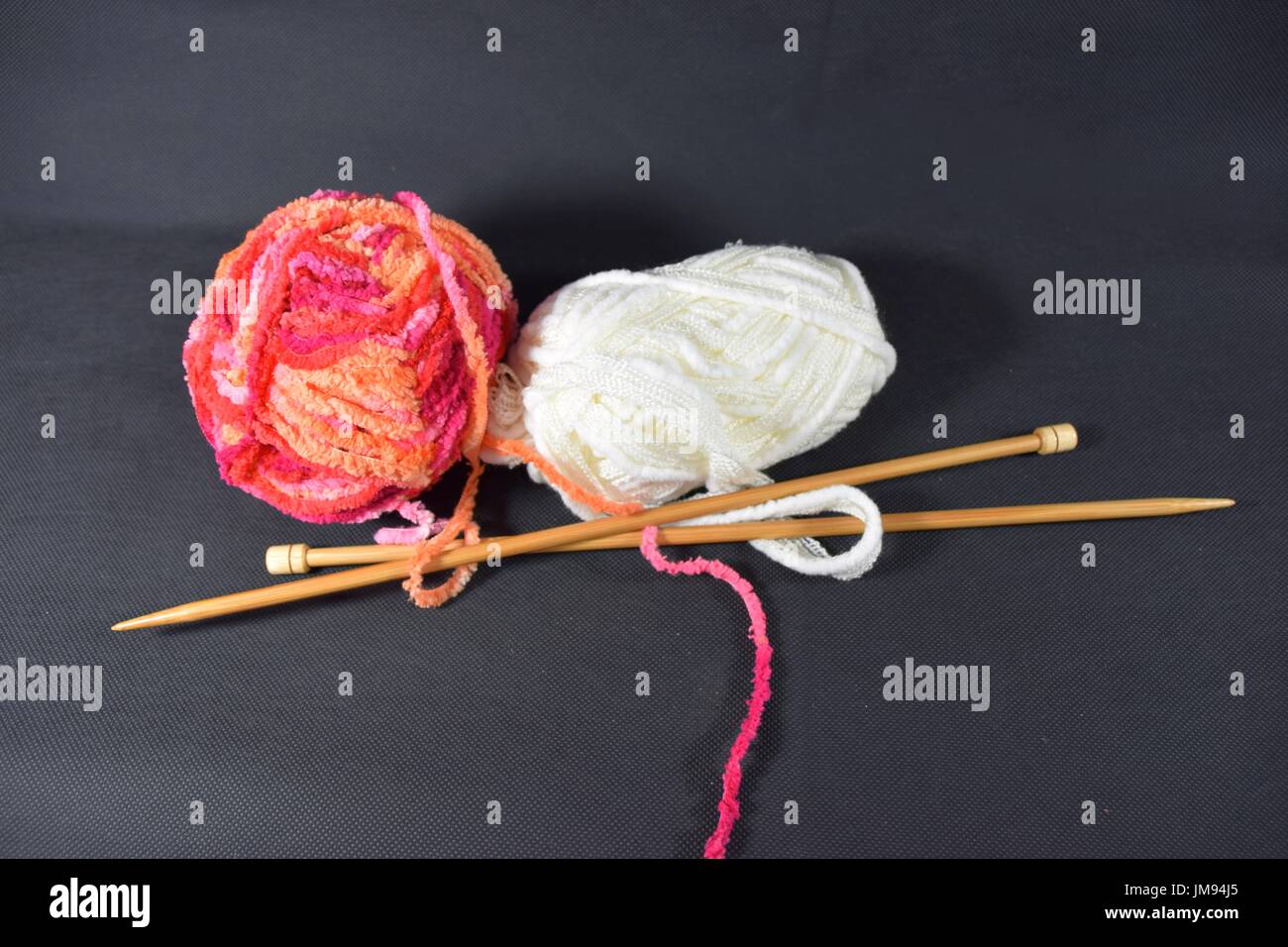 balls of wool for knitting and crocheting work done by hand Stock Photo