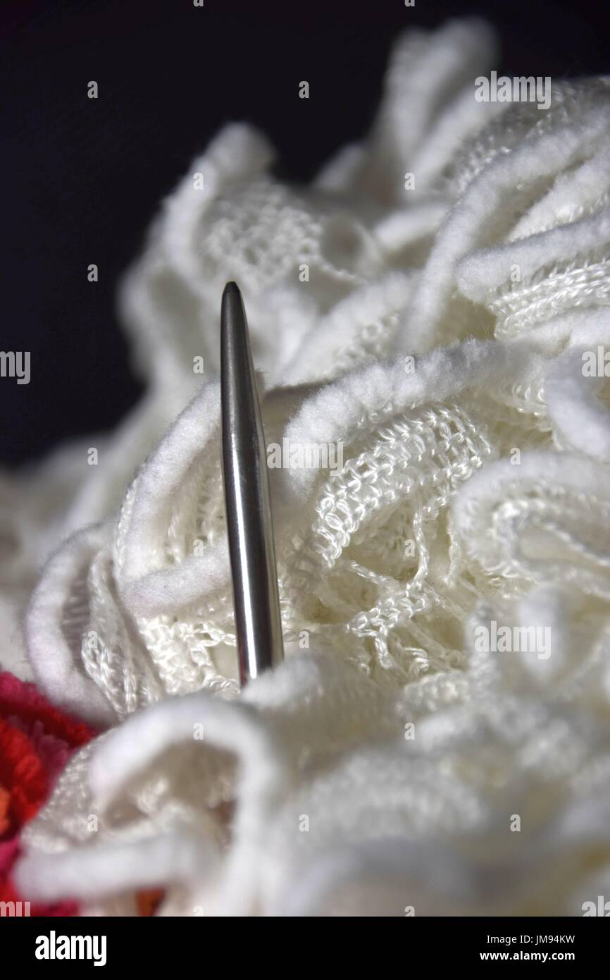 balls of wool for knitting and crocheting work done by hand Stock Photo