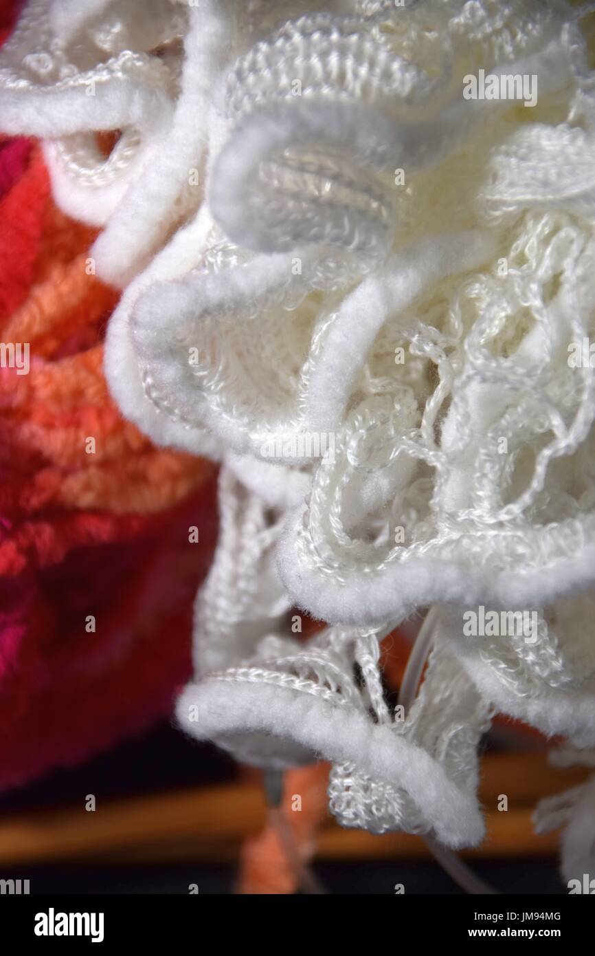 balls of wool for knitting and crocheting work done by hand Stock Photo