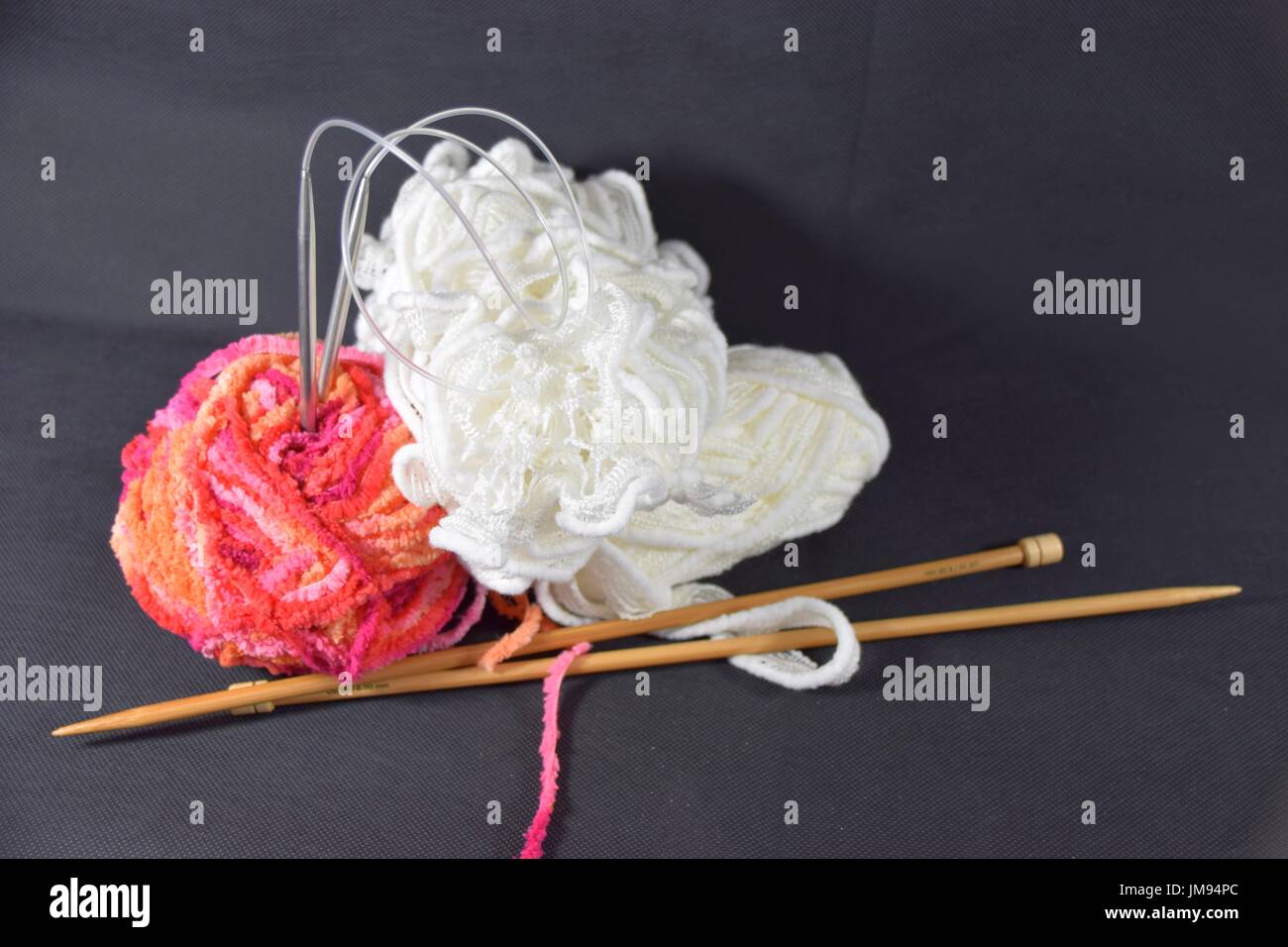 balls of wool for knitting and crocheting work done by hand Stock Photo