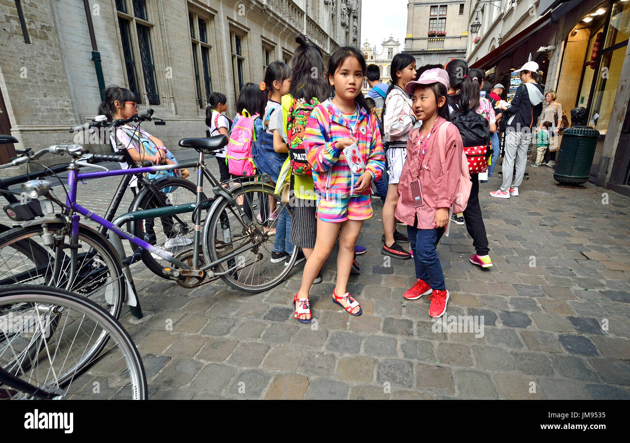 Brussels, Belgium. Chinese children on an organised trip in central Brussels Stock Photo