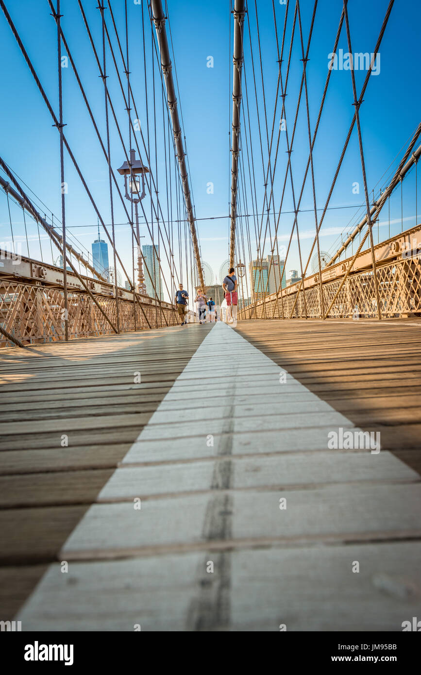 Views of Lower Manhattan and New York from the Brooklyn Bridge during summertime, New York, USA Stock Photo