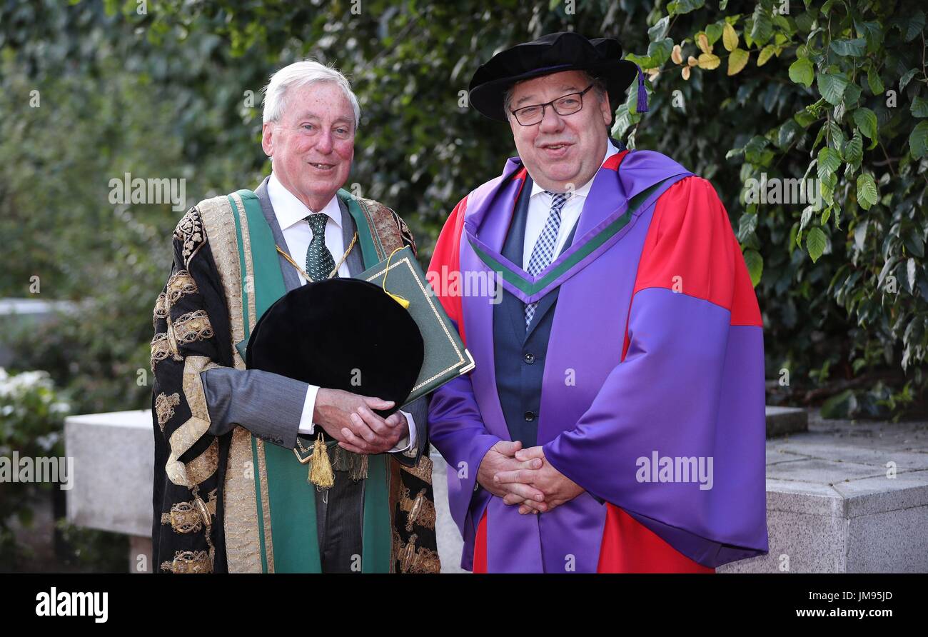 Former Taoiseach Brian Cowen (right) with the Chancellor of the National University of Ireland Maurice Manning after receiving an honorary degree from the National University of Ireland at Dublin Castle. Stock Photo