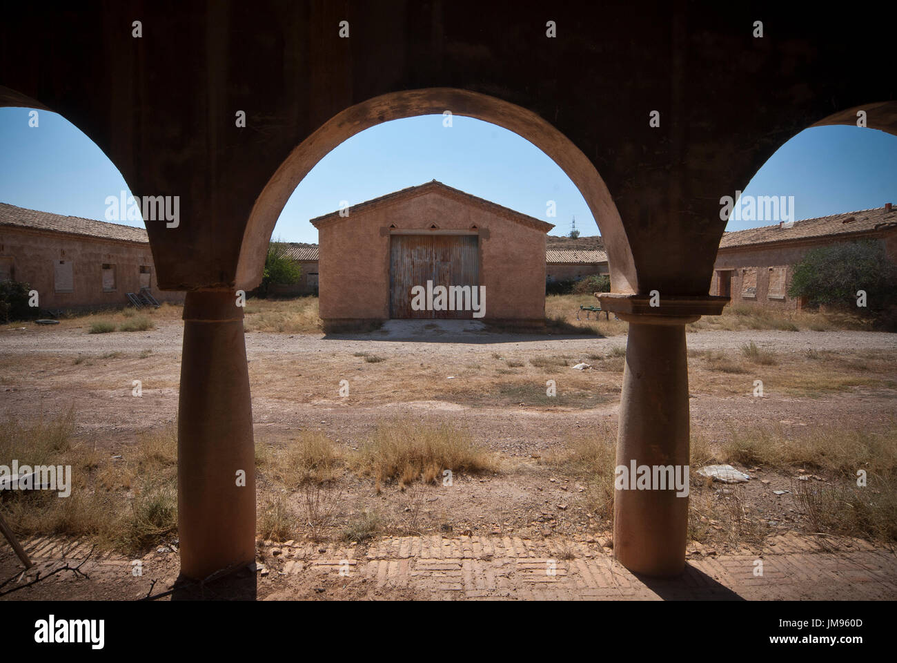 Image of the barracks from Camp Russia, now use as private storage facility. This camp was built initially as a garrison for Franco's military in 1938, after the war, this compound served to host workers and family members during the construction of the new city of Belchite, the forced labor formed by Republican prisoners lived in terrible conditions in nearby shacks that have disappeared long time ago. Stock Photo