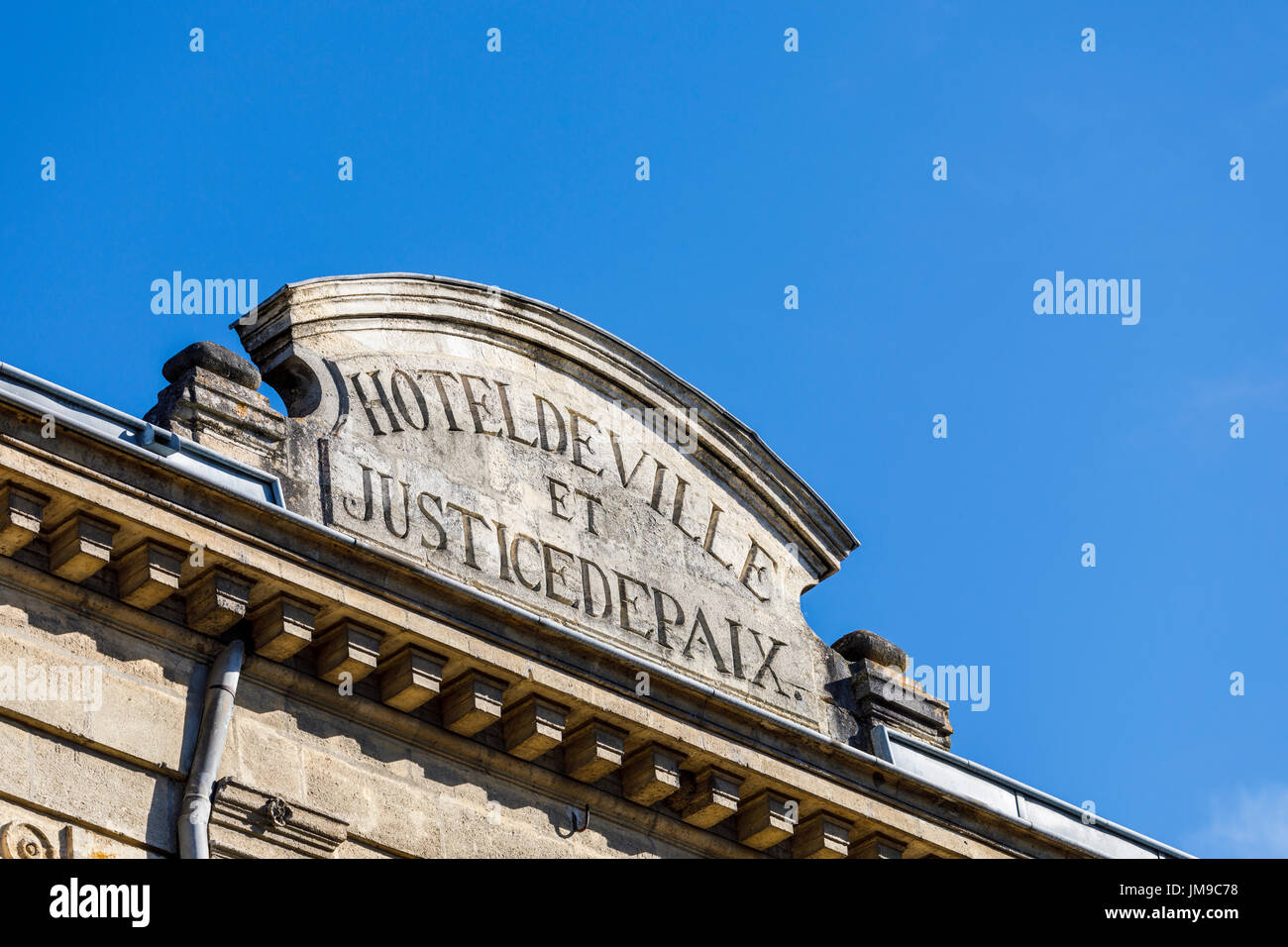 Inscription on Hotel de Ville (town hall) and Justice de Paix (civil court), Cadillac, Gironde department, Nouvelle-Aquitaine, southwestern France Stock Photo