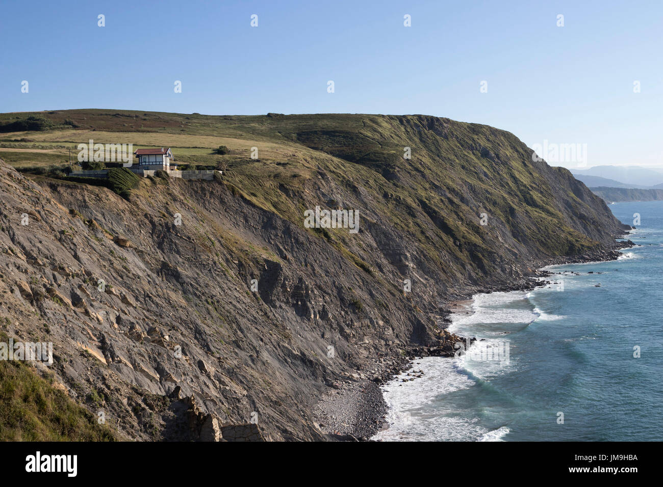 House at the edge of a cliff in Barrika (Bizkaia, Euskadi, Spain). Stock Photo