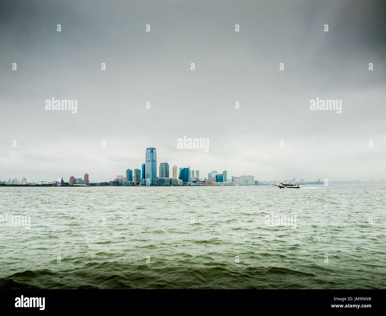 Distant Manhattan Island on a cloudy day Stock Photo