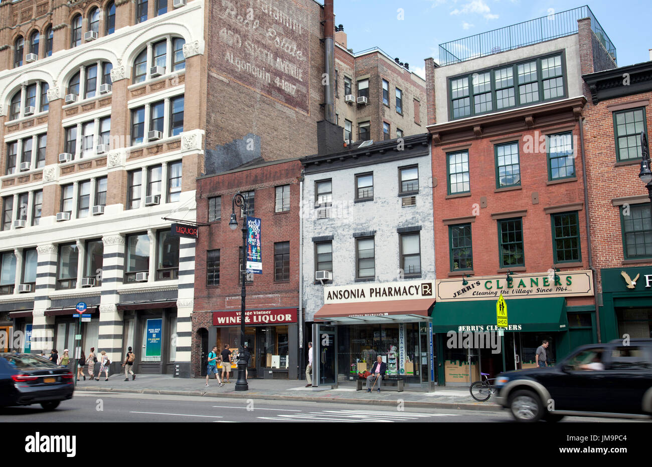 Stores along 6th Ave in Manhattan - NYC - USA Stock Photo