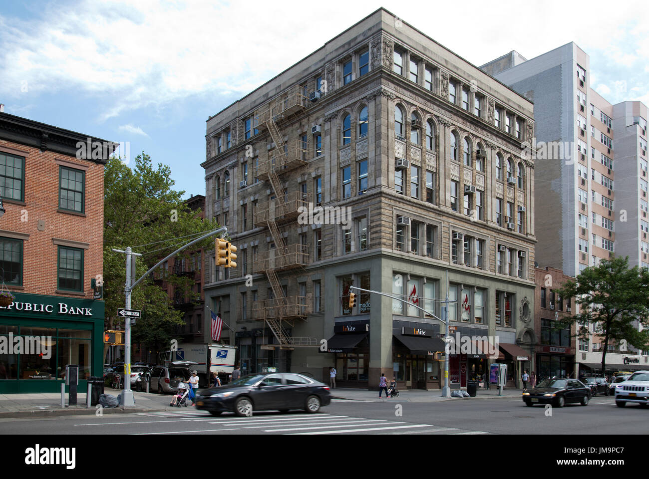 Stores along 6th Ave in Manhattan - NYC - USA Stock Photo