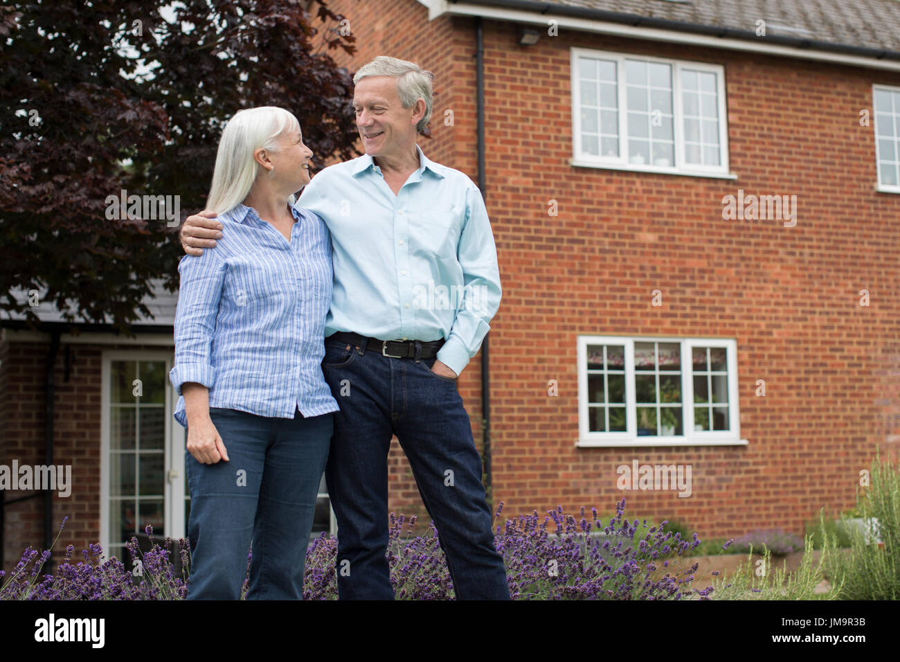 Standing outside home hires stock photography and images Alamy