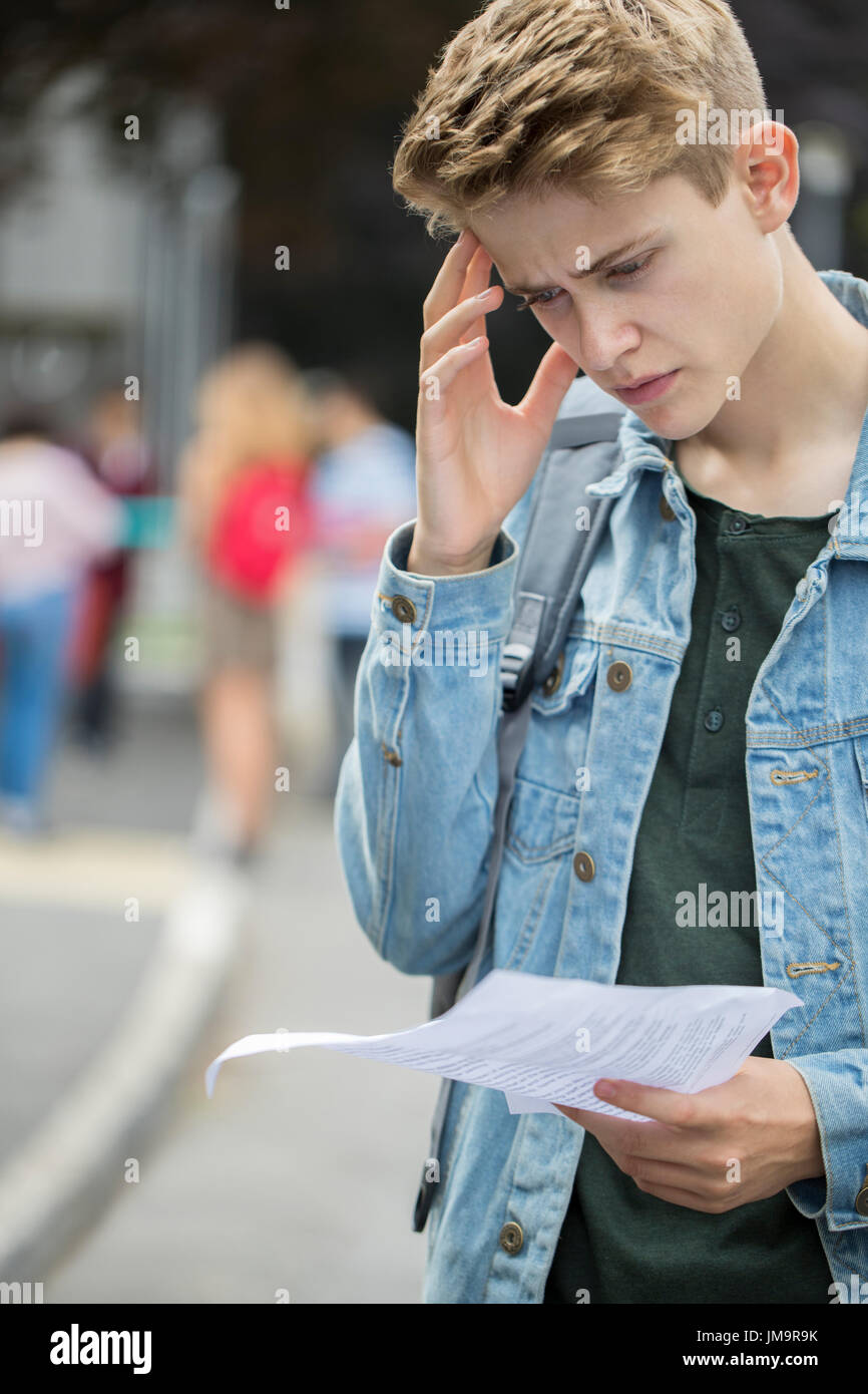 Teenage Boy Disappointed With Exam Results Stock Photo
