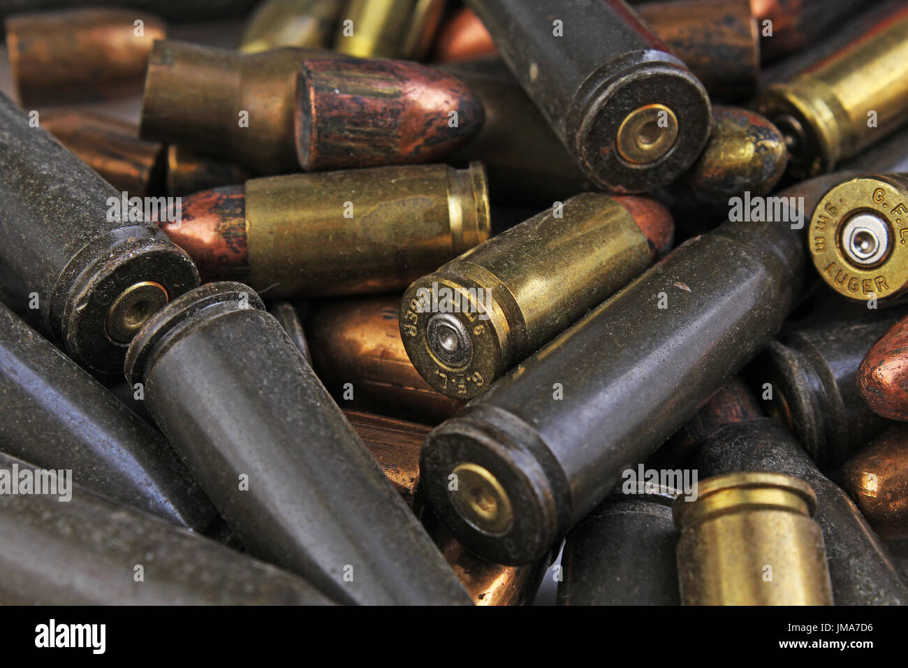 Heap of gun bullets. Weapon Cartridge case sleeve background texture, 7