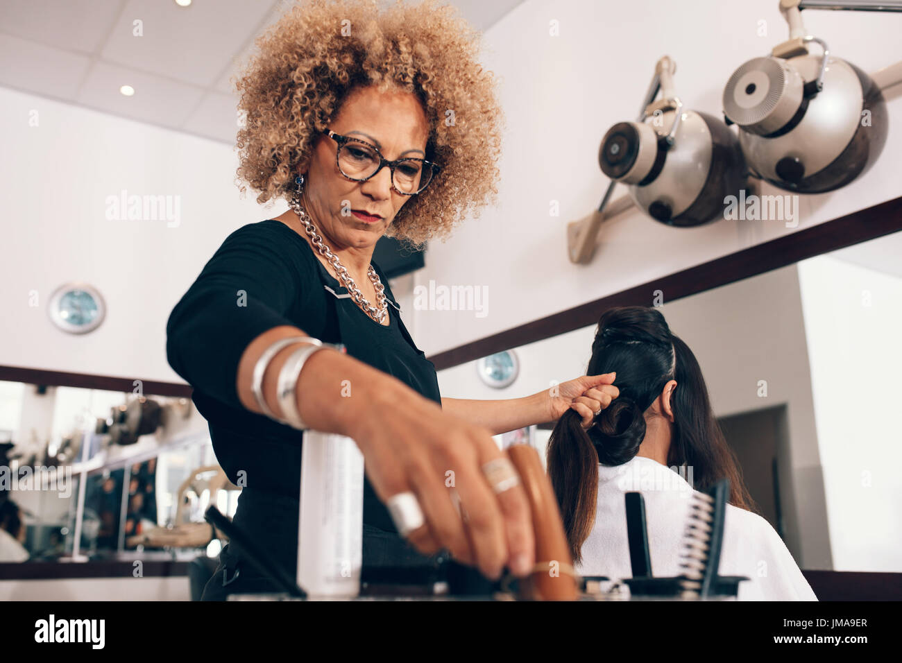 Woman hairdresser hi-res stock photography and images - Alamy