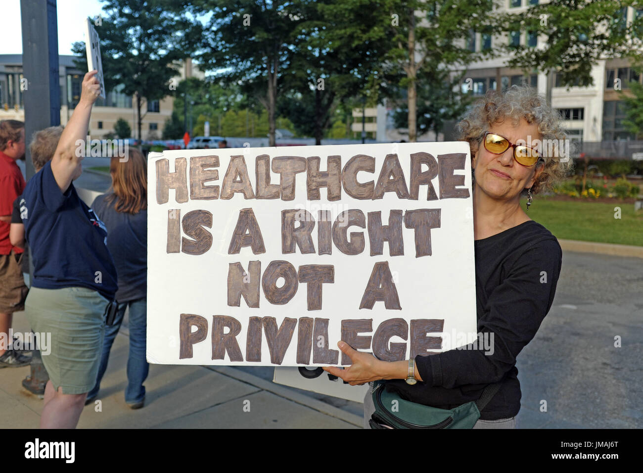 Youngstown, Ohio, USA. 25th July, 2017. Protesters demonstrate against Trumpcare on the streets of Youngstown, Ohio, USA, during a political rally by President Donald Trump Credit: Mark Kanning/Alamy Live News Stock Photo