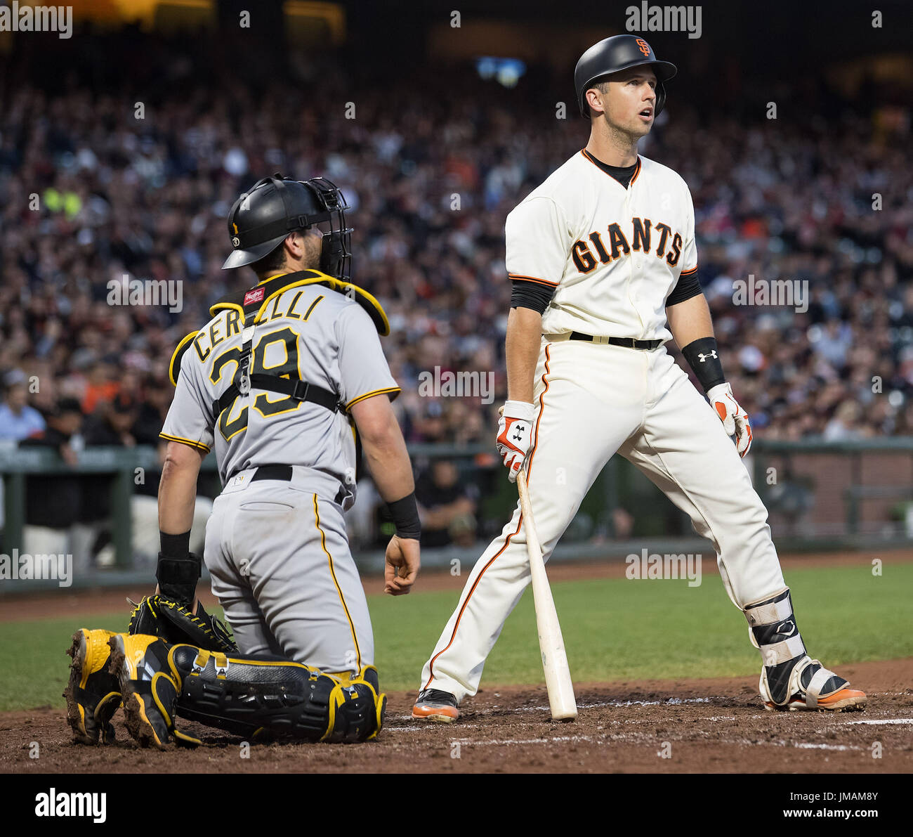 San Francisco, California, USA. 25th July, 2017. San Francisco Giants catcher Buster Posey (28) reacts to a called strike, during a MLB game between the Pittsburgh Pirates and the San Francisco Giants at AT&T Park in San Francisco, California. Valerie Shoaps/CSM/Alamy Live News Stock Photo