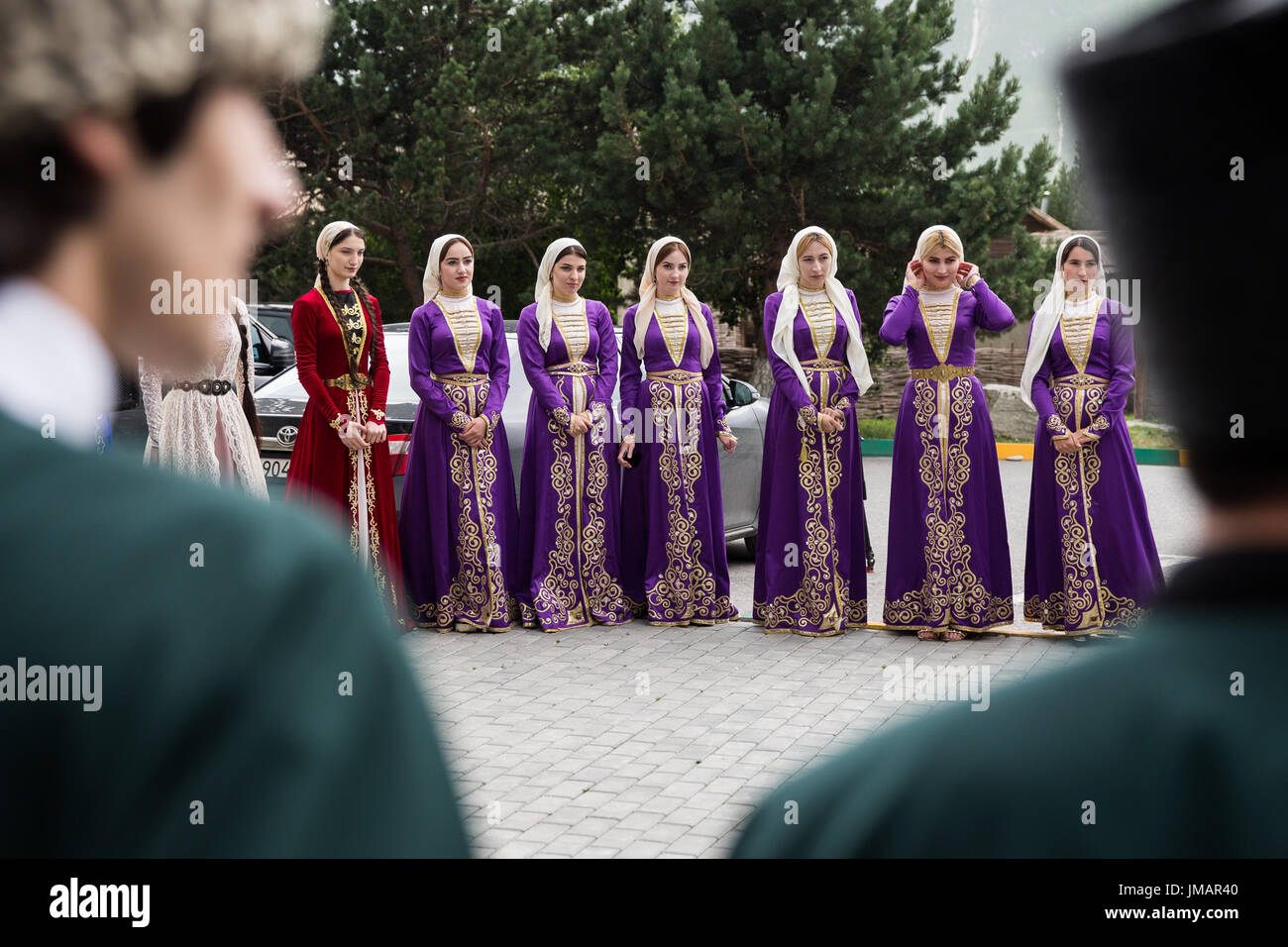 Chechnya, Russia. 25th July, 2017. Girls line up to welcome guests in Vedensky District, Chechnya, Russia, July 25, 2017. Credit: Bai Xueqi/Xinhua/Alamy Live News Stock Photo