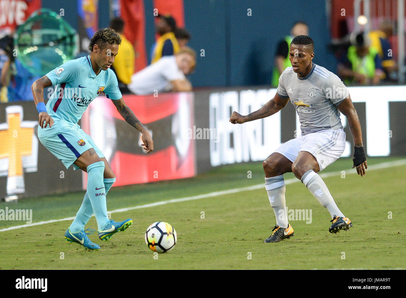 Landover, Maryland, USA. 26th July, 2017. Barcelona Forward NEYMAR (11) in action against Manchester United's ANTONIO VALENCIA (25) during the first half of the game held at FEDEXFIELD in Landover, Maryland. Credit: Amy Sanderson/ZUMA Wire/Alamy Live News Stock Photo