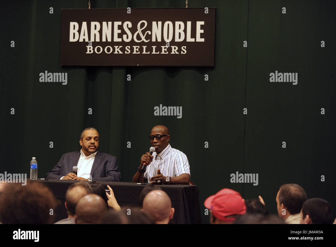 New York City. 25th July, 2017. Ray Norman and Wesley Snipes sign copies of their new book 'Talon Of God' at Barnes & Noble Tribeca on July 25, 2017 in New York City. | Verwendung weltweit/picture alliance Credit: dpa/Alamy Live News Stock Photo
