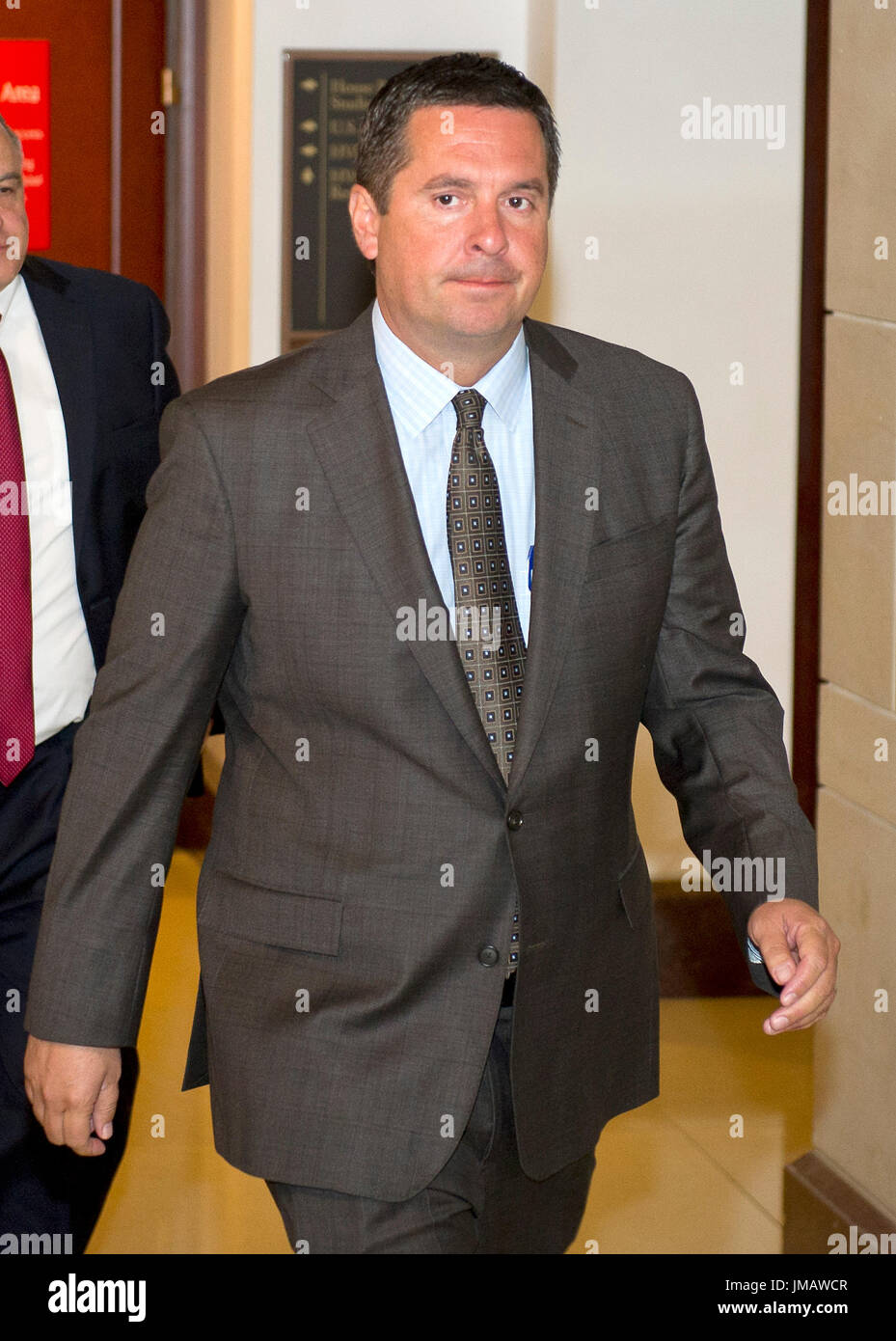 Washington, Us. 25th July, 2017. United States Representative Devin Nunes (Republican of California) departs after hearing testimony by Trump senior advisor Jared Kushner before the US House Select Committee on Intelligence on Kushner's role meeting the Russians in relation to the 2016 US Presidential election on Capitol Hill in Washington, DC on Tuesday, July 25, 2017. Credit: Ron Sachs/CNP (RESTRICTION: NO New York or New Jersey Newspapers or newspapers within a 75 mile radius of New York City) - NO WIRE SERVICE - Photo: Ron Sachs/Consolidated/dpa/Alamy Live News Stock Photo