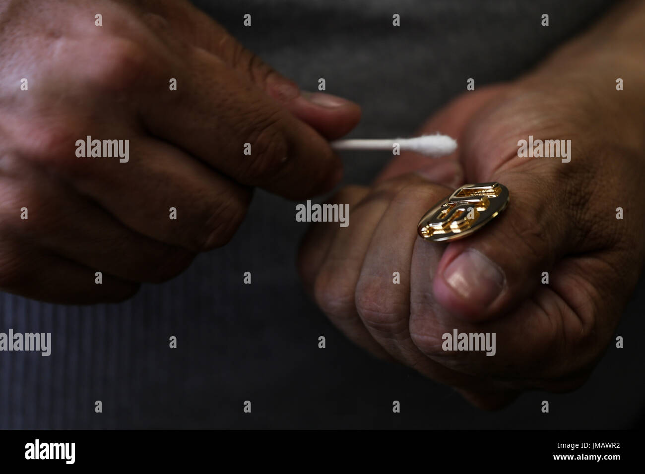 Tijuana, Baja California, Mexico. 7th July, 2017. HECTOR BARAJAS-VARELA, a deported U.S. Army veteran, polishes one of his medals at the Deported Veterans Support House in Tijuana, Baja California, Mexico. Credit: Joel Angel Juarez/ZUMA Wire/Alamy Live News Stock Photo