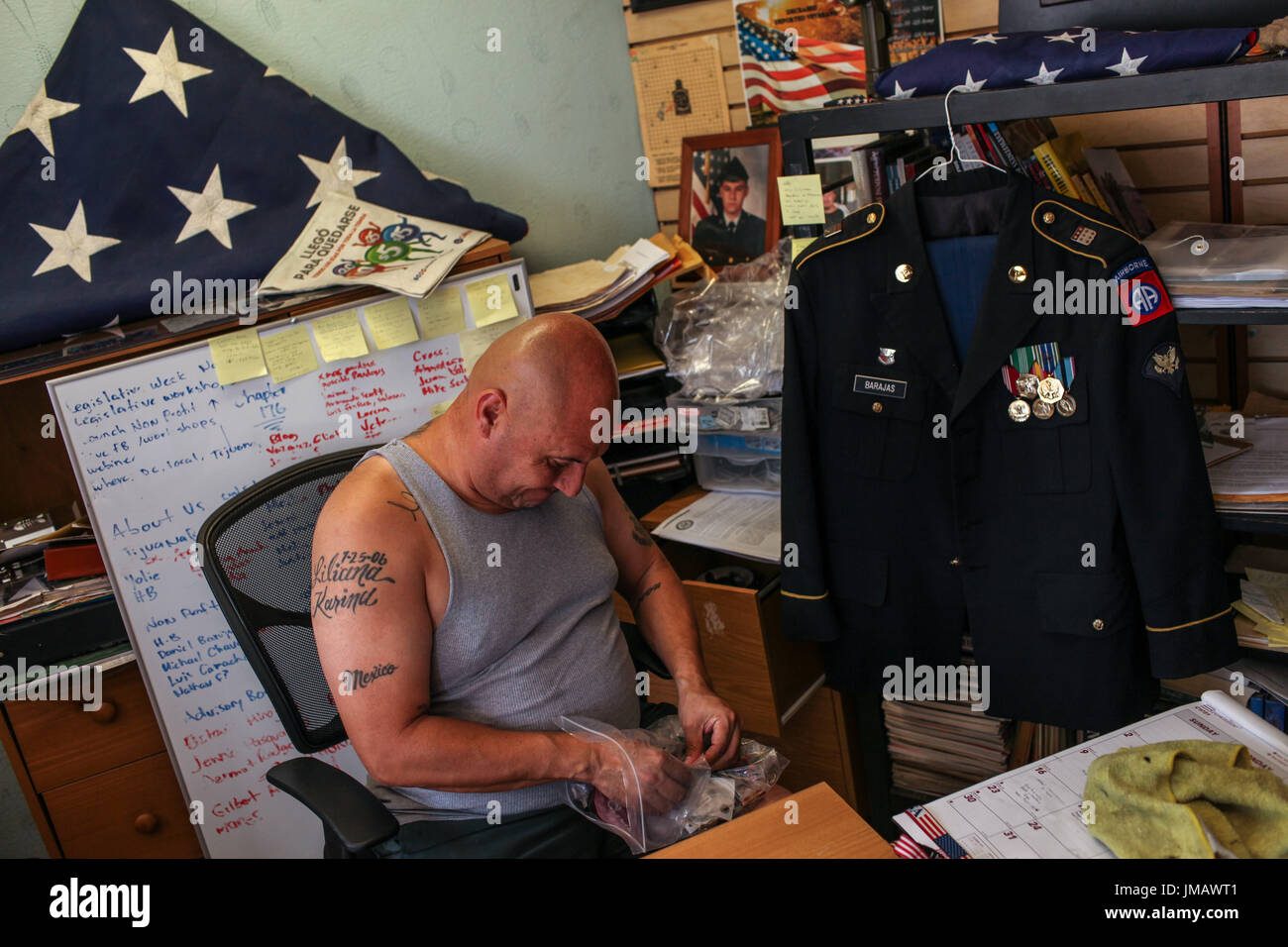 Tijuana, Baja California, Mexico. 7th July, 2017. HECTOR BARAJAS-VARELA, a deported U.S. Army veteran, prepares medals for his uniform at the Deported Veterans Support House in Tijuana, Baja California, Mexico. Barajas-Varela runs a shelter and resource center for deported U.S. military veterans in Tijuana known as, ''The Bunker. Credit: Joel Angel Juarez/ZUMA Wire/Alamy Live News Stock Photo