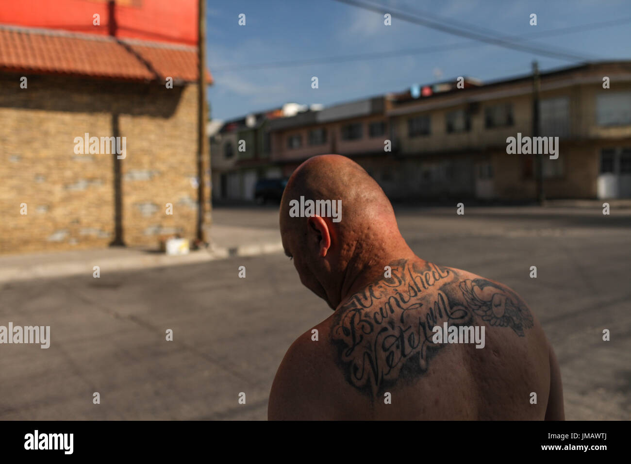 Tijuana, Baja California, Mexico. 7th July, 2017. HECTOR BARAJAS-VARELA, a deported U.S. Army veteran, stands outside the Deported Veterans Support House in Tijuana, Baja California, Mexico. His back tattoo reads, ''U.S. Banished Veteran. Credit: Joel Angel Juarez/ZUMA Wire/Alamy Live News Stock Photo