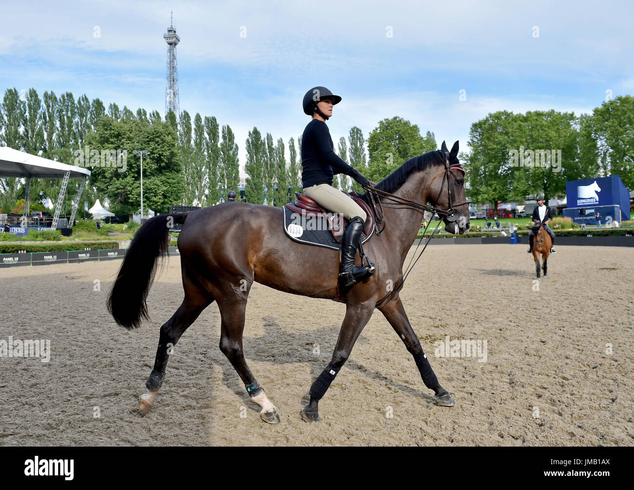 Berlin, Germany. 27th July, 2017. Georgina Bloomberg training on her horse  Calista during the warm-up for the Global Champions Tour in Berlin,  Germany, 27 July 2017. The show jumping is to take