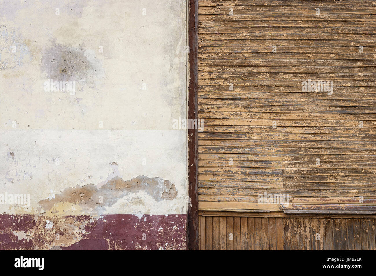 Old wooden and concrete walls separated the brown bar. The paint on the