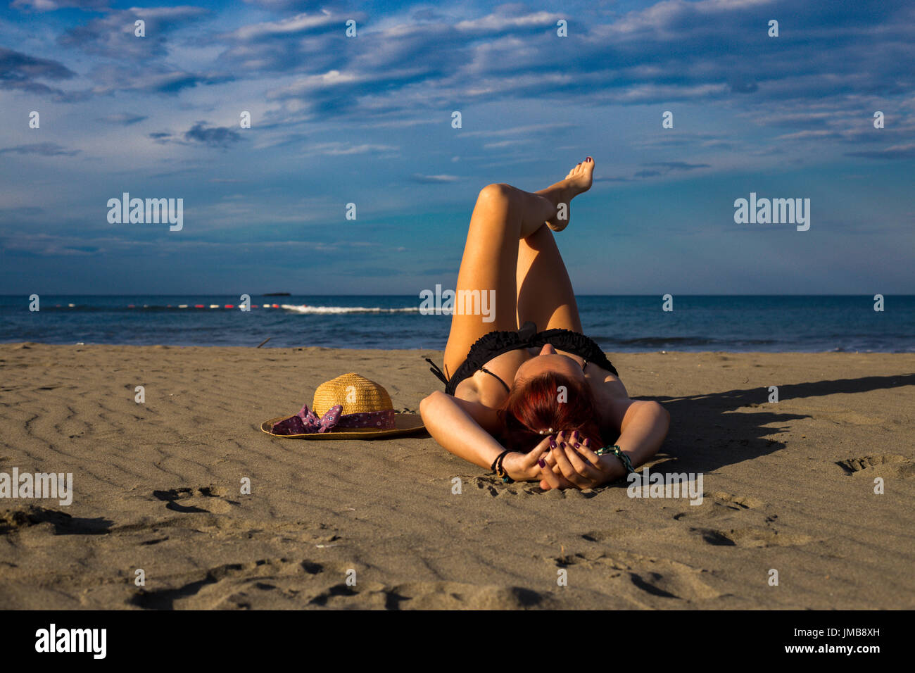 Girl In Bikini Laying On High Resolution Stock Photography and Images -  Alamy