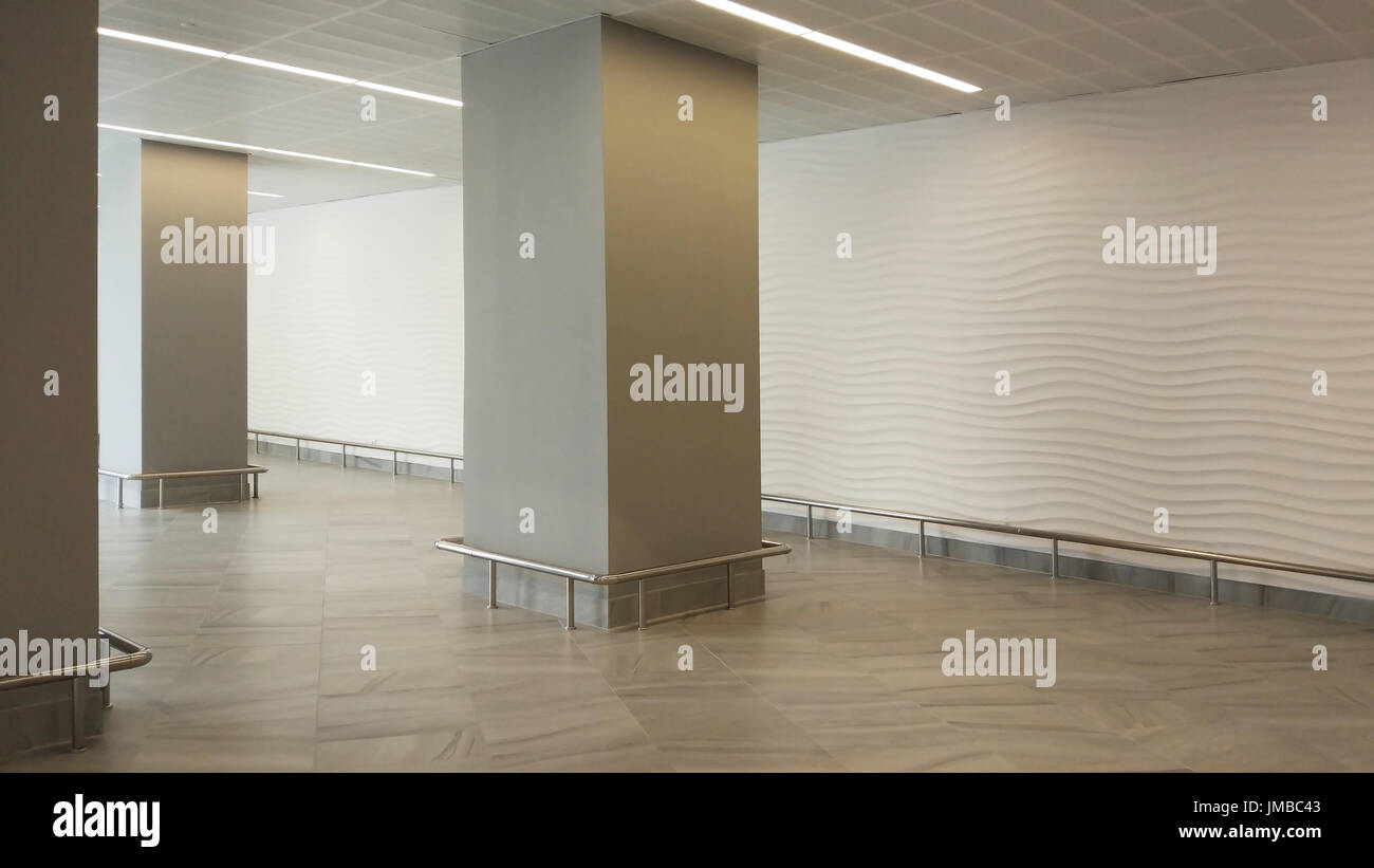 Interior empty office light room with white wallpaper without furniture