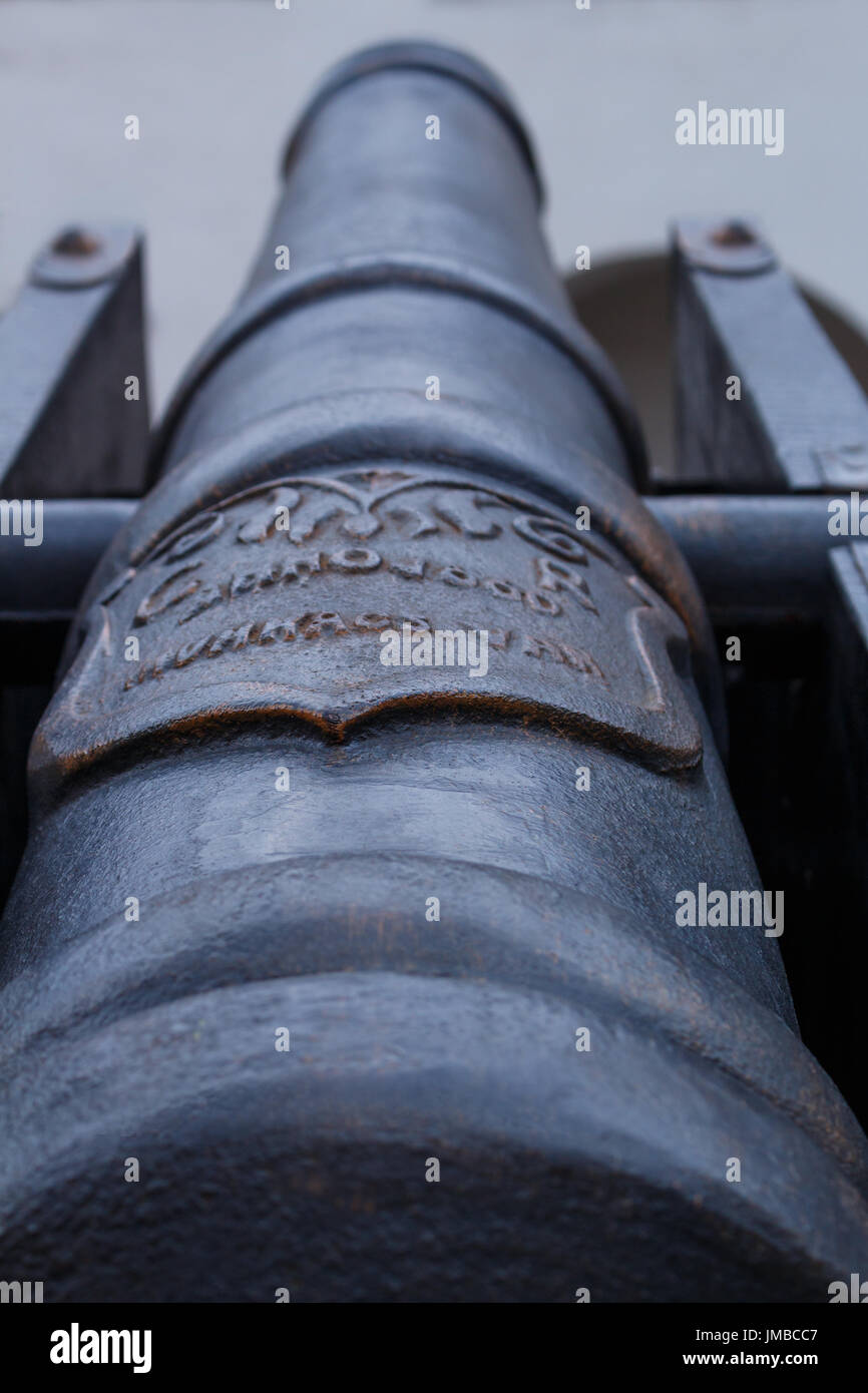 Focused on inscription on ancient cannon close up Stock Photo