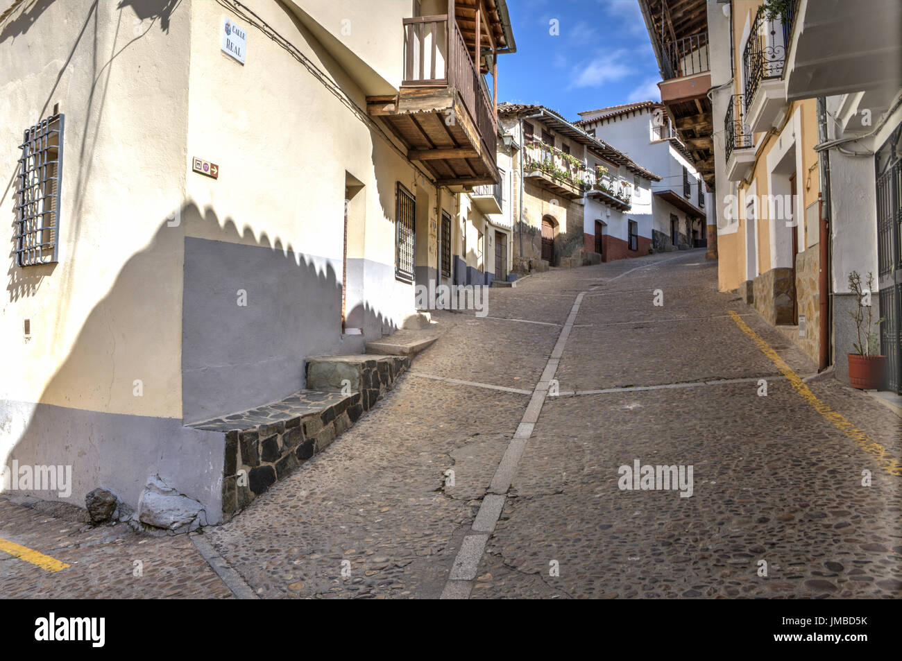 Guadalupe old town steep street, Caceres, Extremadura, Spain Stock Photo