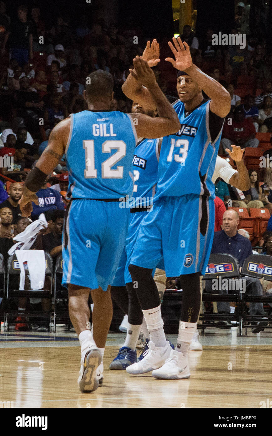 Jerome Williams #13 Power high fives teammate Kendall Gill #12 during Game #1 against Ball Hogs Big3 Week 5 3-on-3 tournament UIC Pavilion July 23,2017 Chicago,Illinois. Stock Photo