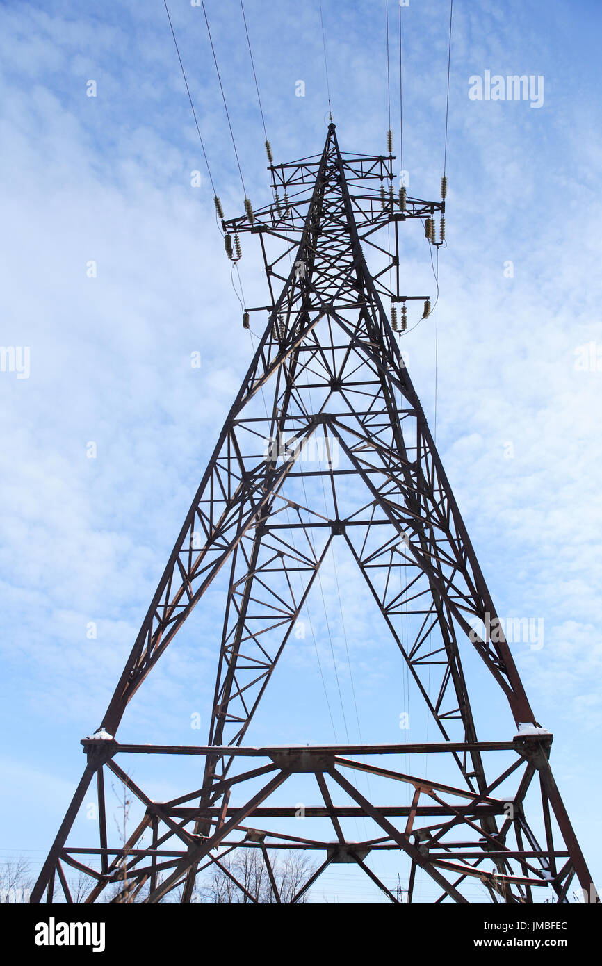 High voltage tower against blue sky Stock Photo - Alamy
