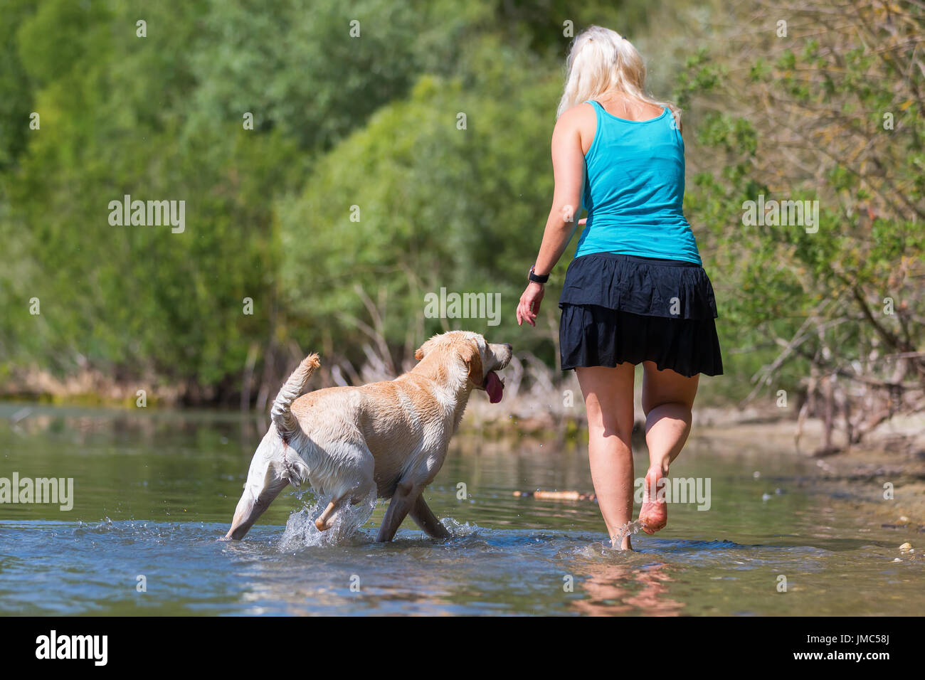 Rear view mature woman playing hi-res stock photography and images - Alamy