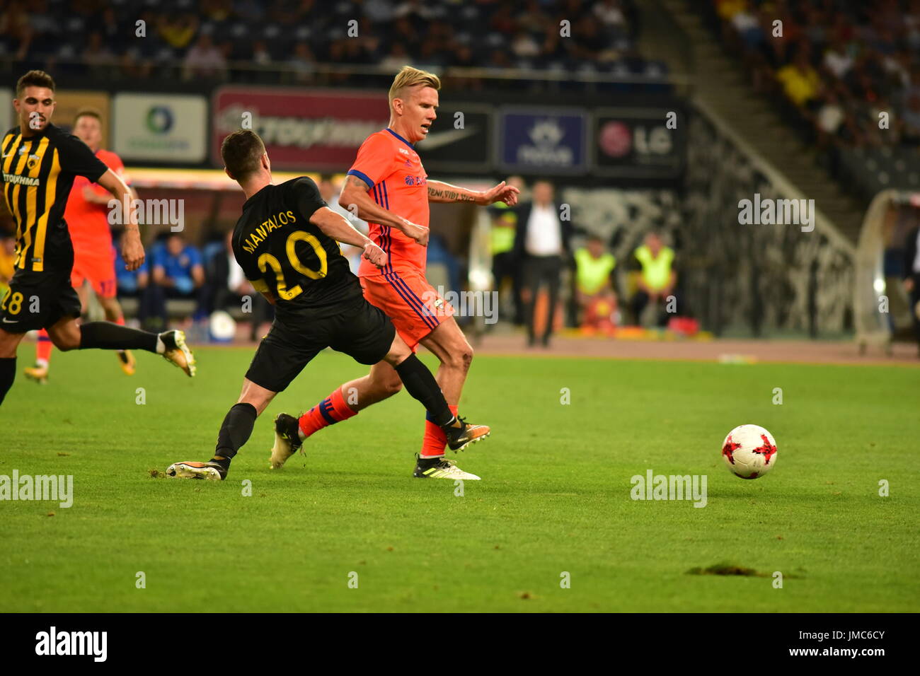 Athens, Greece. 25th July, 2017. Petros Mantalos (C) (no 20) of AEK makes  foul to Pontus Wernbloom (no 3) of CSKA Moskva. Credit: Dimitrios  Karvountzis/Pacific Press/Alamy Live News Stock Photo - Alamy