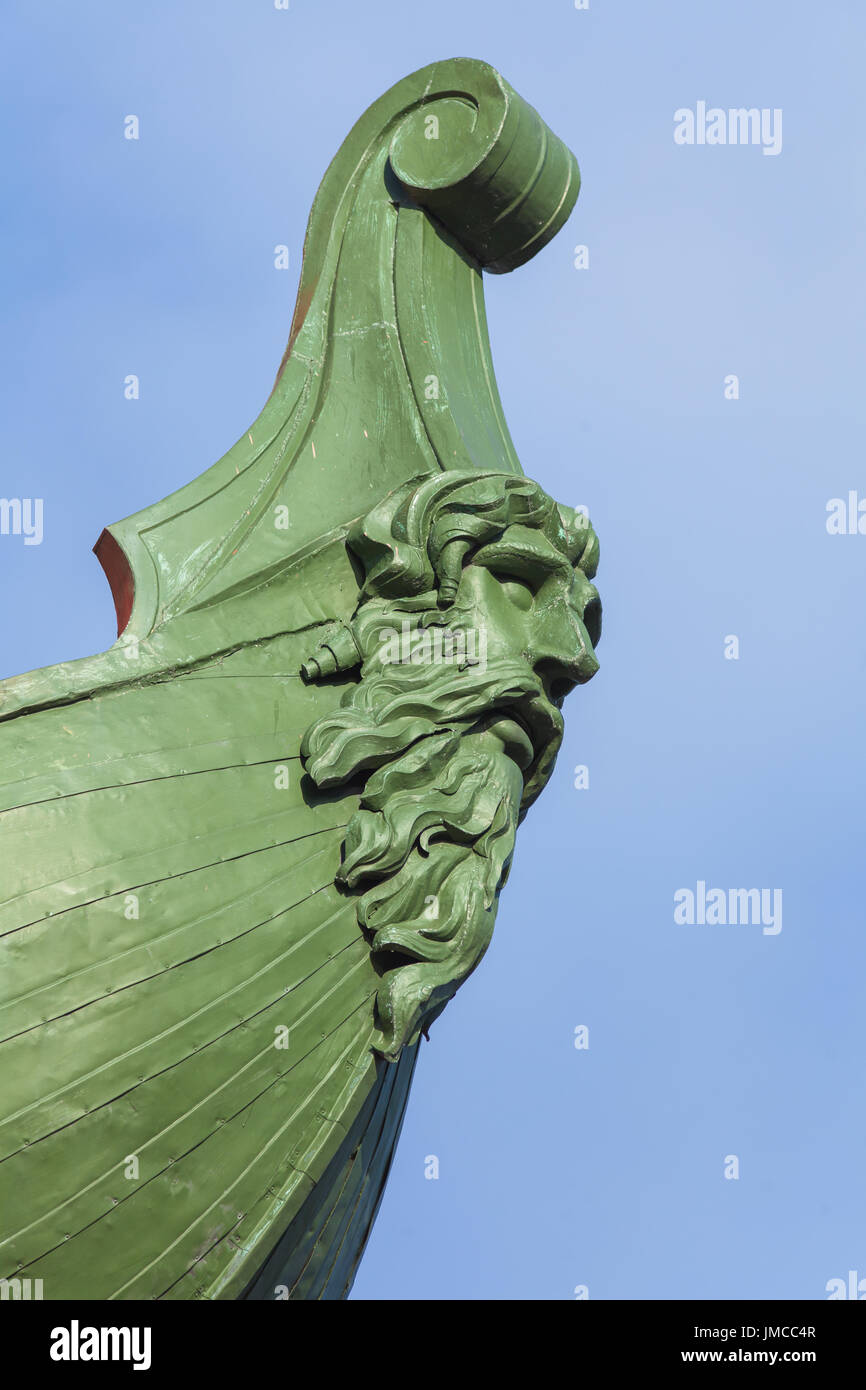 Decorative rostrum of the ship on the rostral column in St. Petersburg ...
