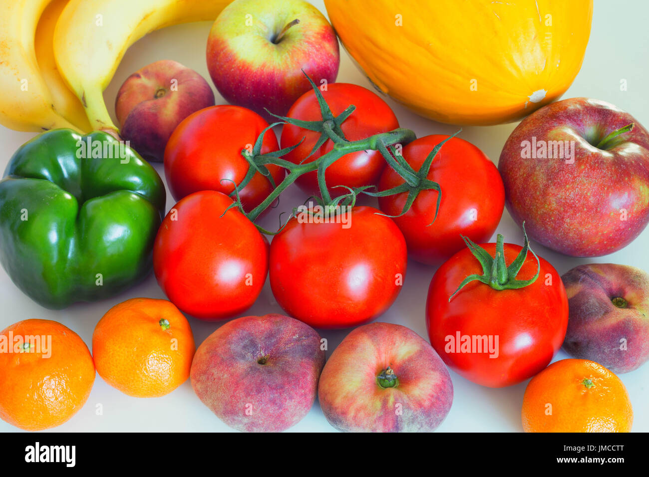 Healthy and juicy vegetables and fruits on the kithen table, an excellent ingredient in a vegetarian mea lor a side dish Stock Photo