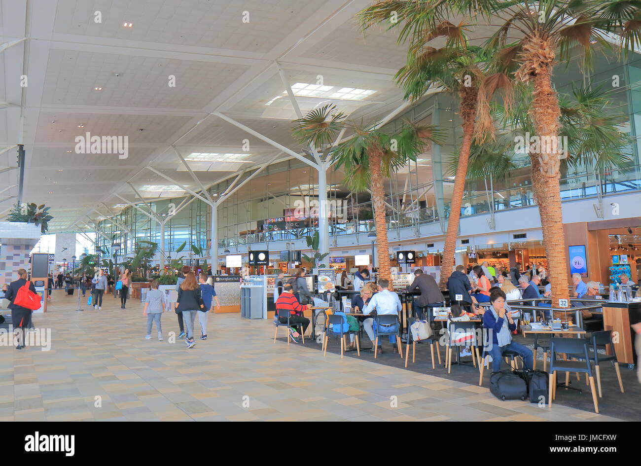 People travel at Brisbane International airport in Brisbane Australia. Stock Photo