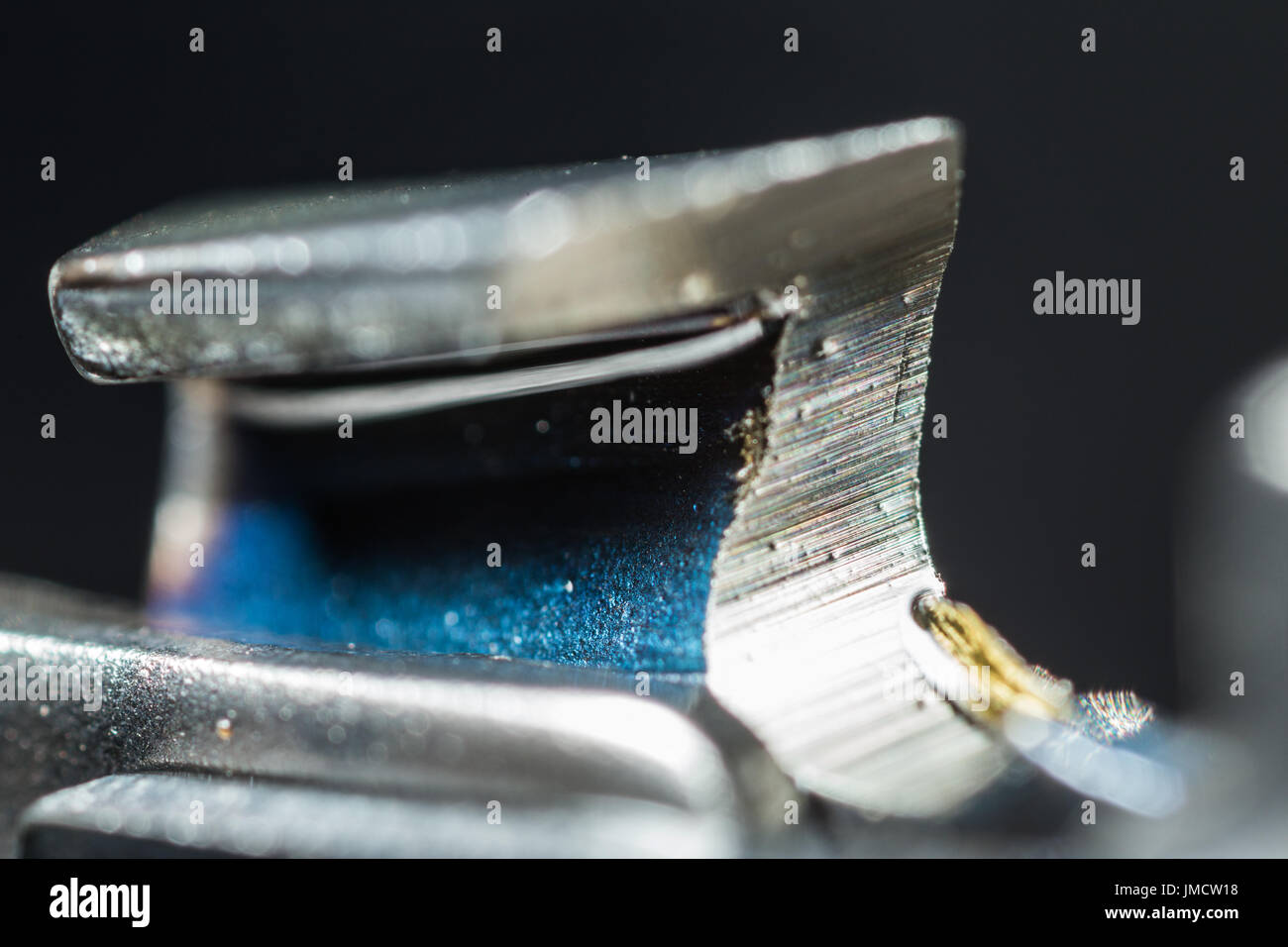 Macro shot of chainsaw tooth Stock Photo