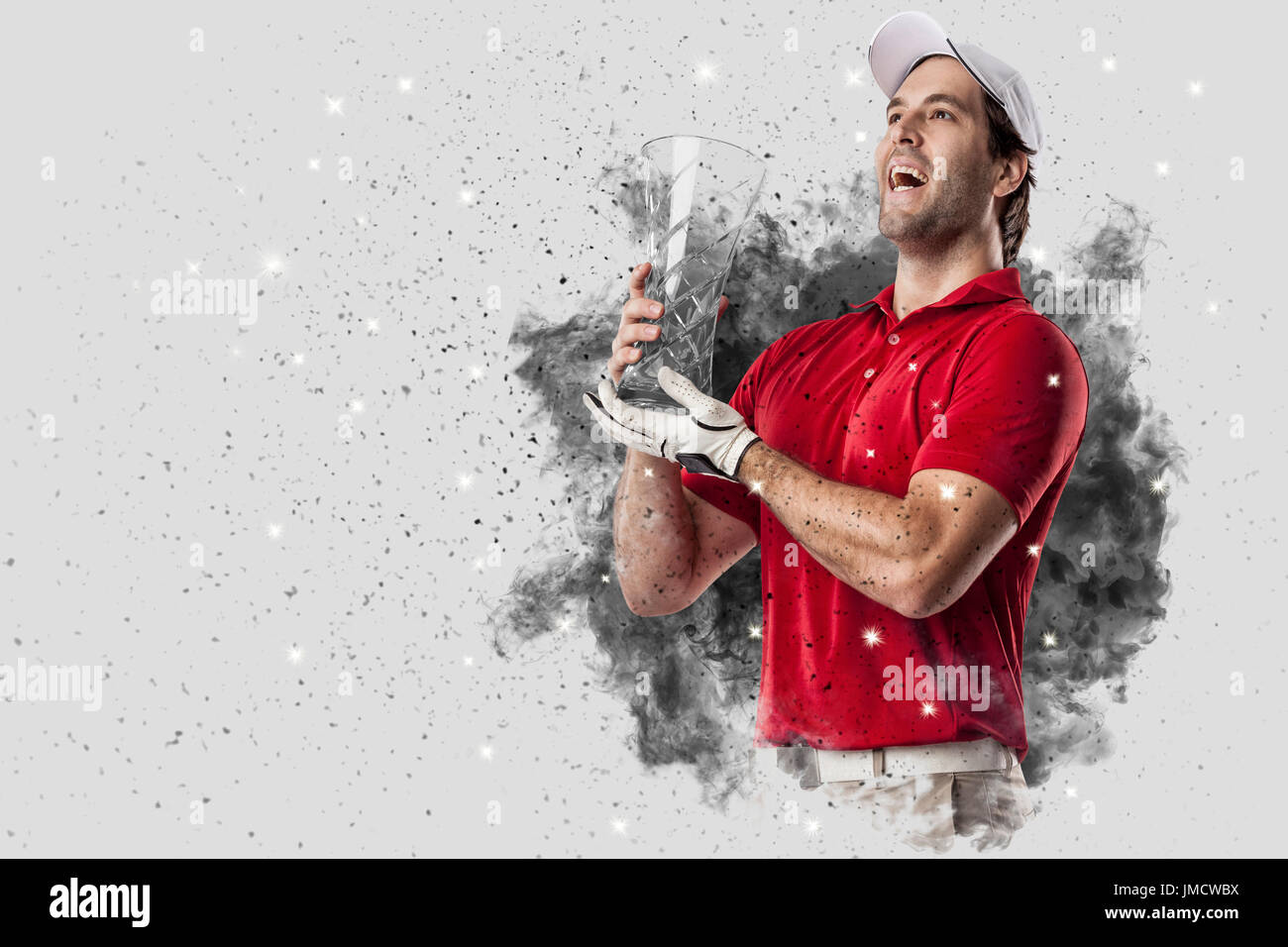 Golf Player with a red uniform coming out of a blast of smoke . Stock Photo