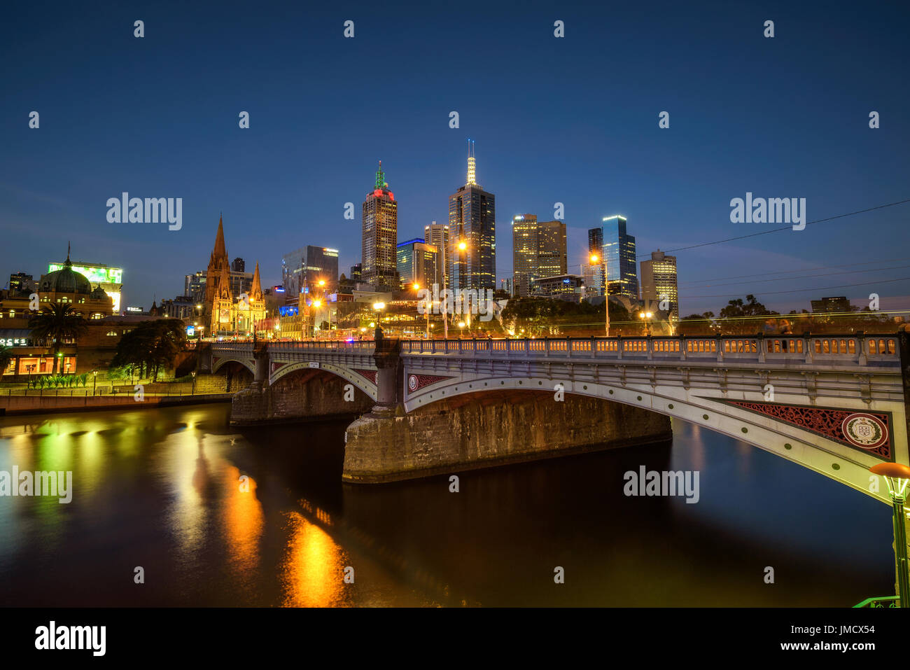 City skyline of Melbourne downtown, Princess Bridge and Yarra River at night. Long exposure. Stock Photo