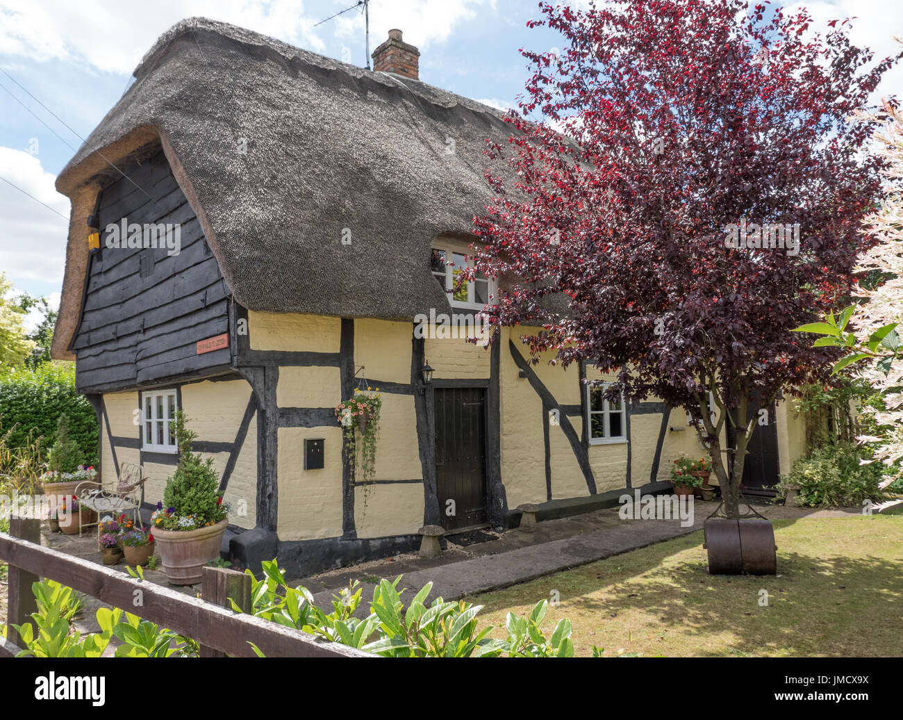Thatched cottage at Frampton on Severn, Gloucestershire, England, UK