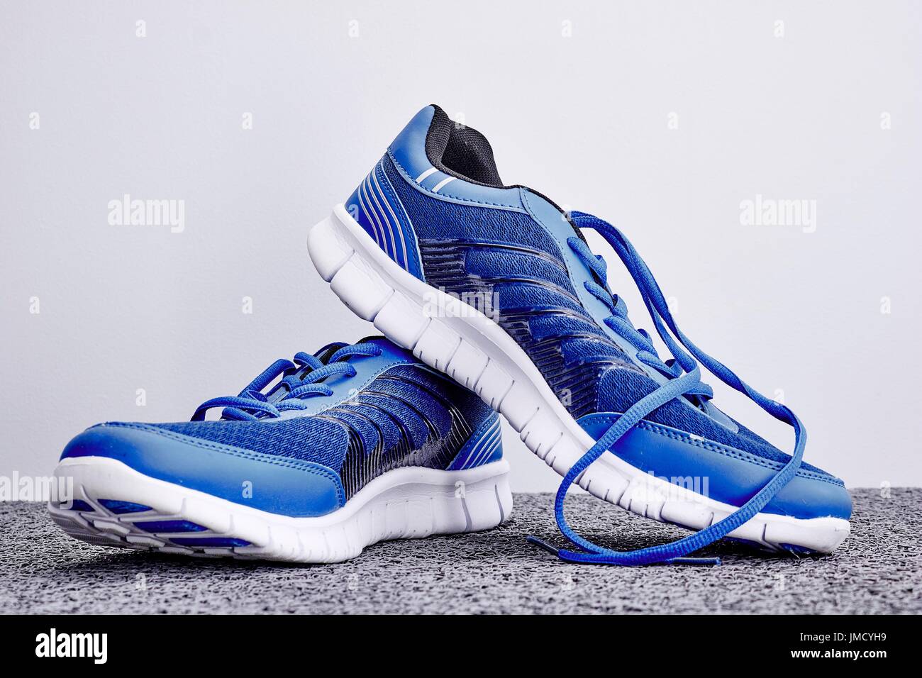 A studio photo of a pair of runners Stock Photo - Alamy