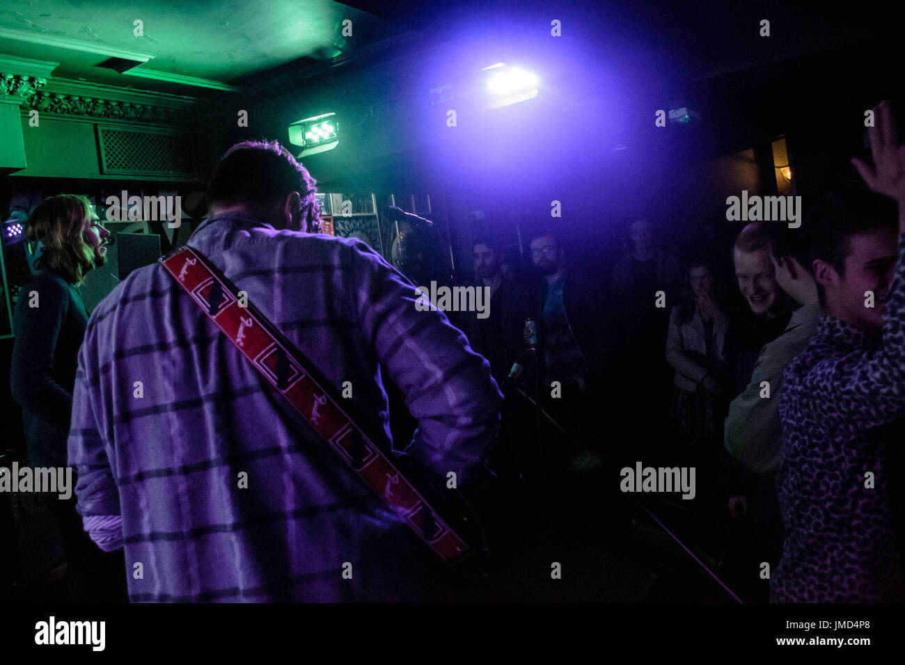Famous musicians, guitarists, band from behind with stage lights Stock Photo Alamy