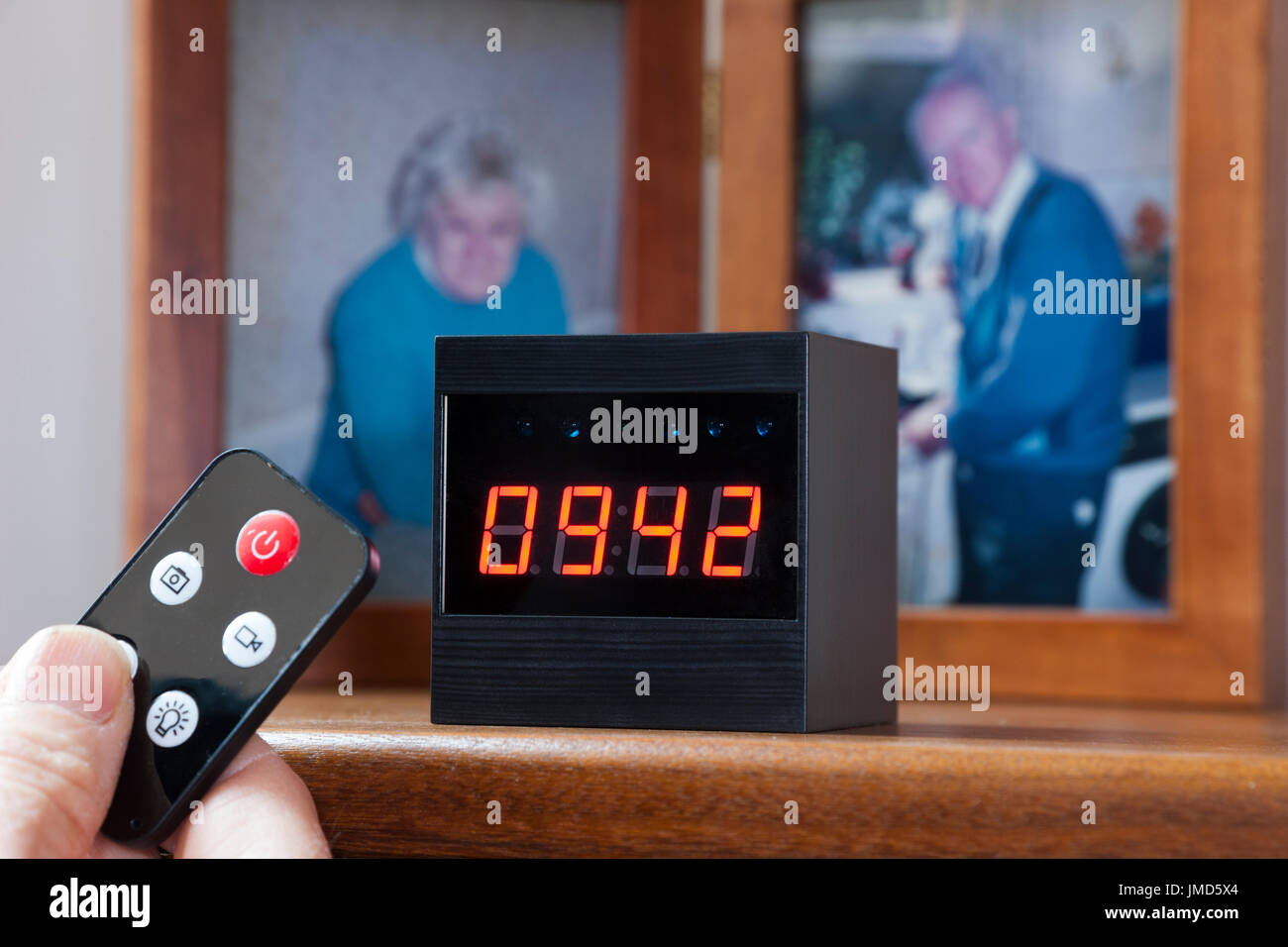 Secret spy camera hidden in a digital clock of the sort used to monitor old people and young children, babies, in the care of others. (88) Stock Photo