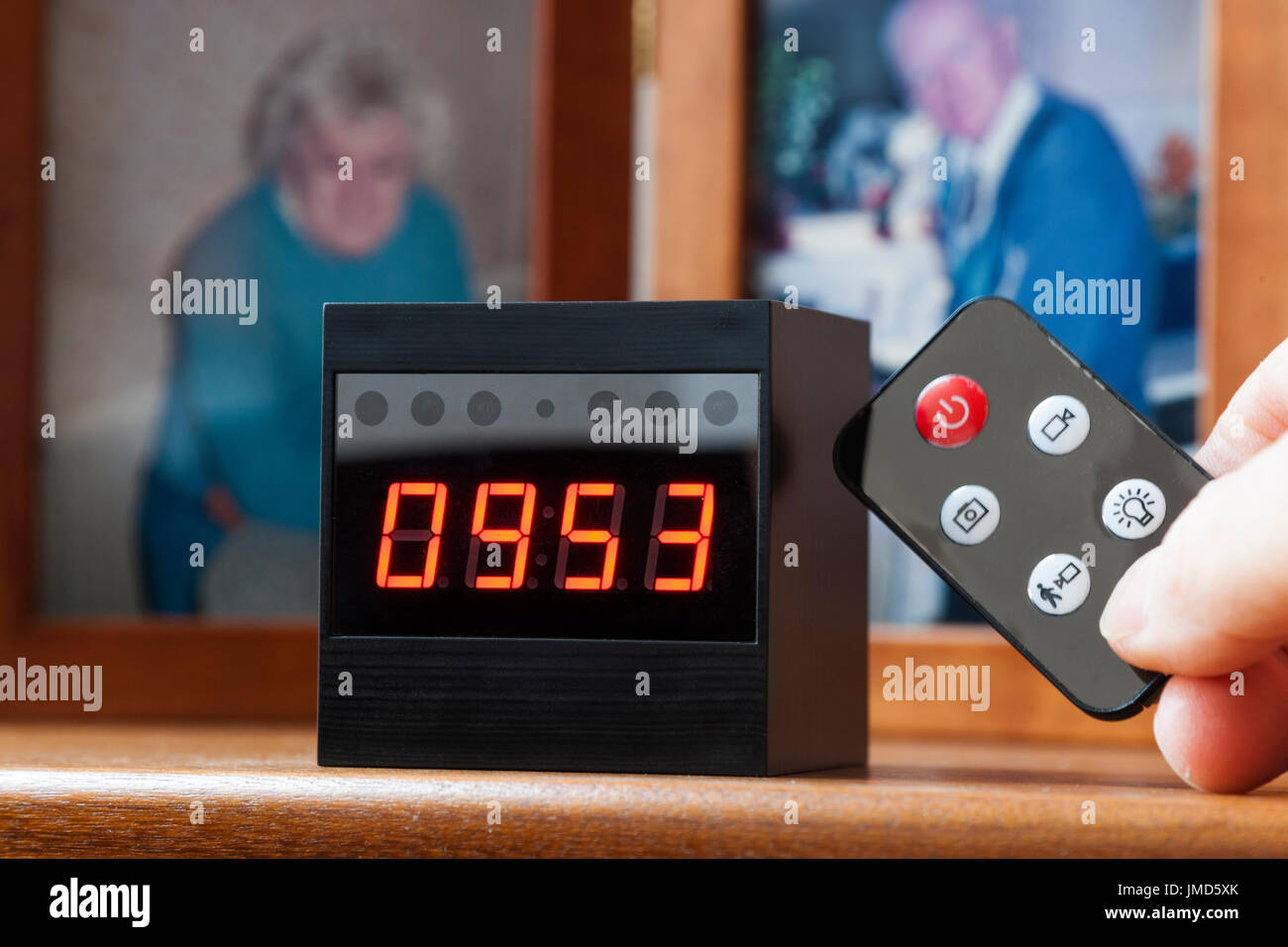 Secret spy camera hidden in a digital clock of the sort used to monitor