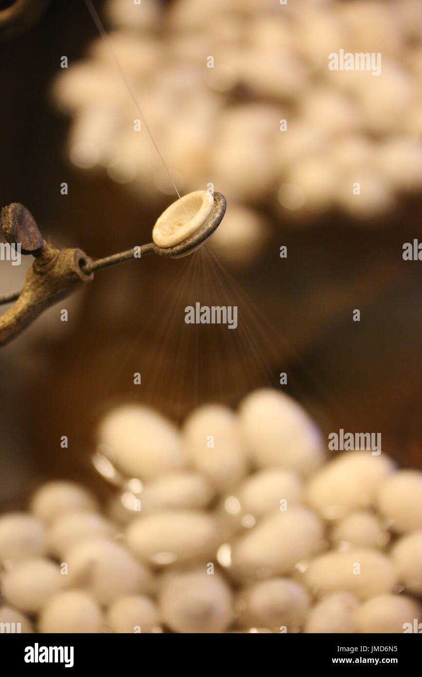 Thread silk processing hi-res stock photography and images - Alamy