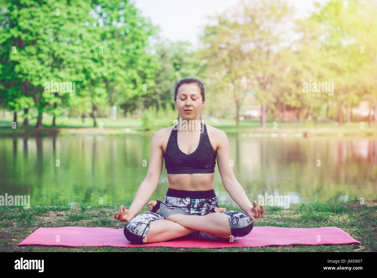 Young women stretching yoga studio hi-res stock photography and images ...