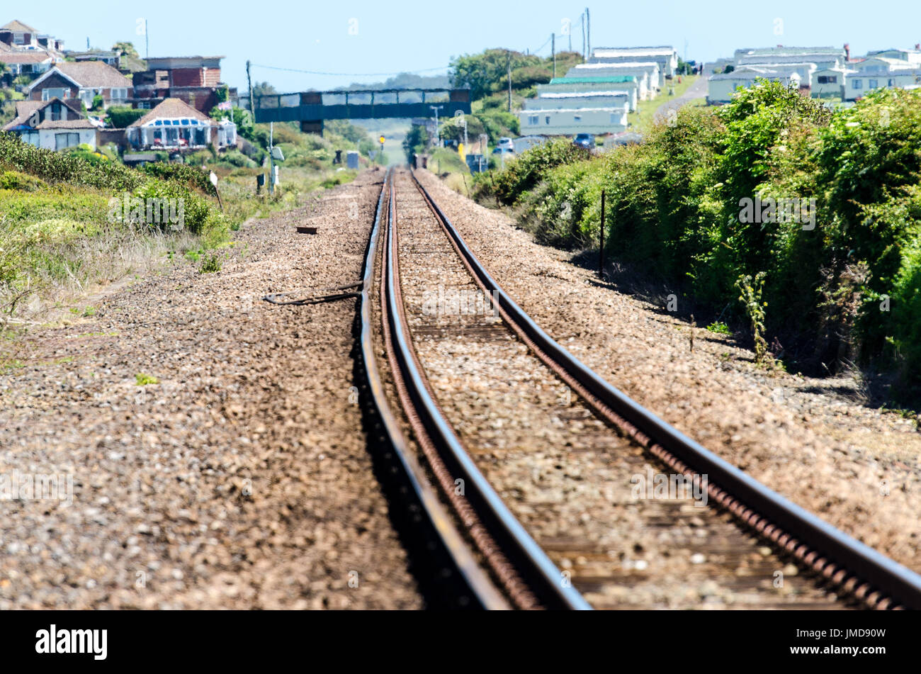 Single track railway line stretches into the distance Stock Photo Alamy